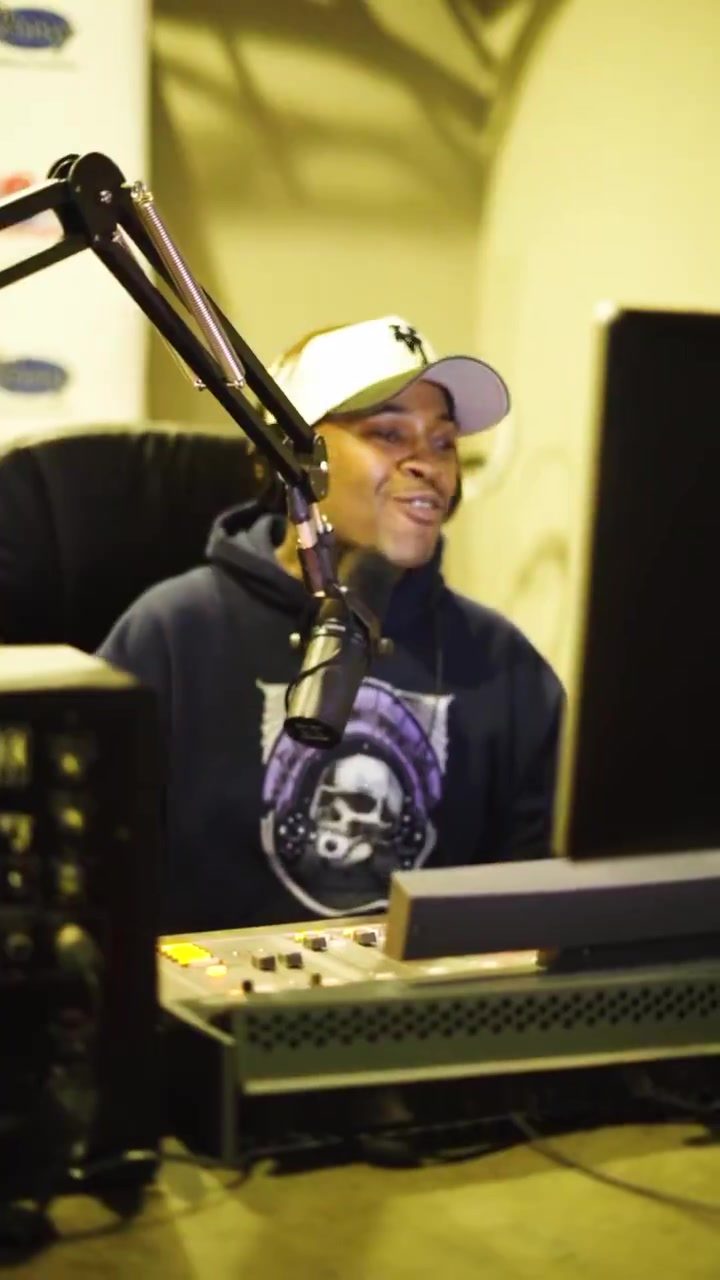 Darren Sewell at the mic in a radio studio